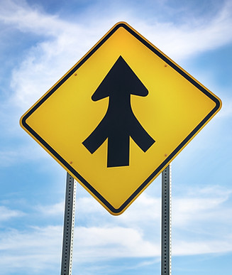 Transformed road sign as symbol of coming together